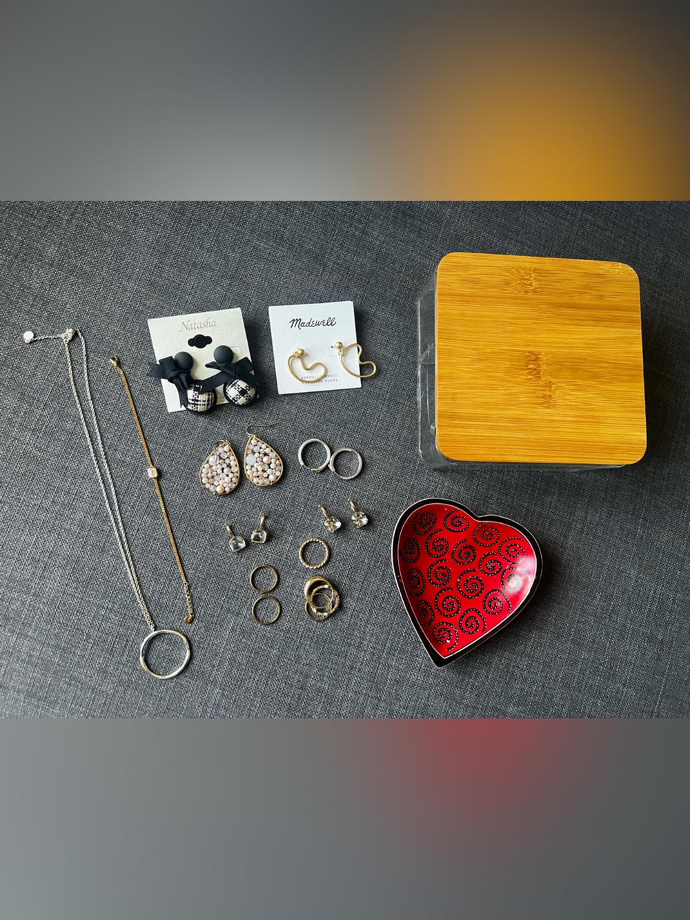 7 Pairs Of earrings, 6 Rings, One Bracelet, one necklace, 2 jewelry organizers